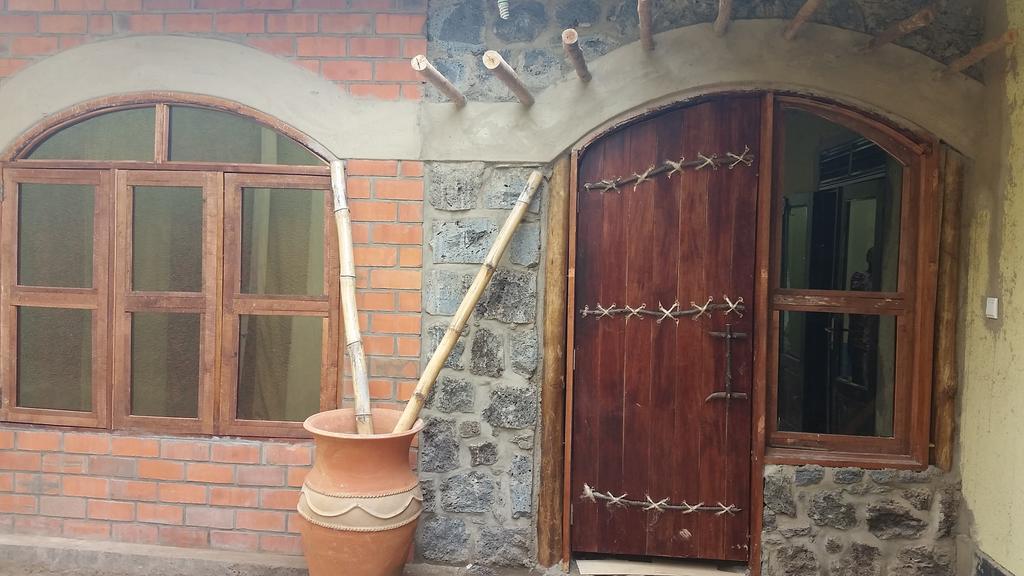 Yambi Guesthouse Kigali Værelse billede